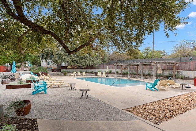 view of swimming pool with a patio