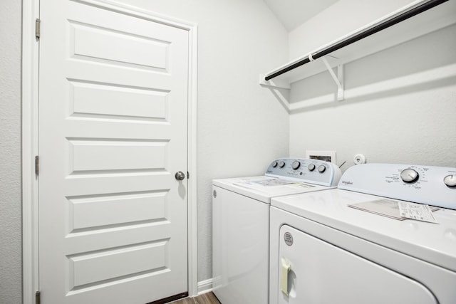 washroom featuring separate washer and dryer