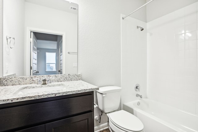 full bathroom with vanity, toilet, and  shower combination