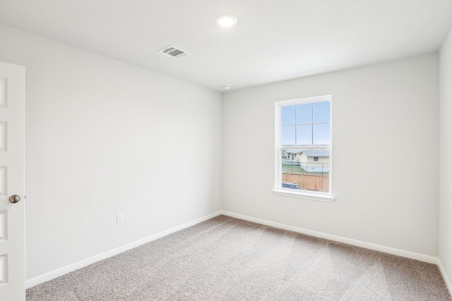 spare room with carpet flooring