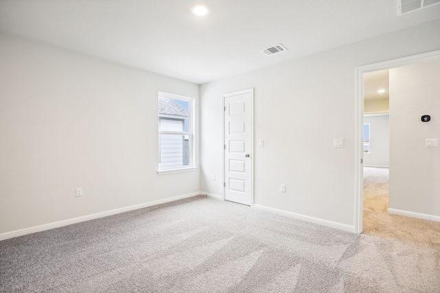 empty room with light carpet