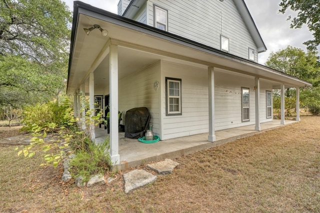 view of side of home featuring a patio