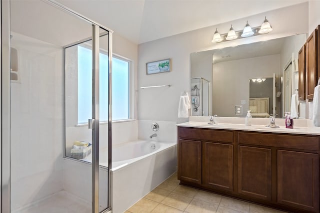 bathroom with vanity, tile patterned floors, and independent shower and bath