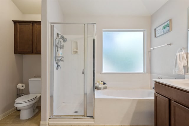 full bathroom with vanity, toilet, tile patterned floors, and shower with separate bathtub