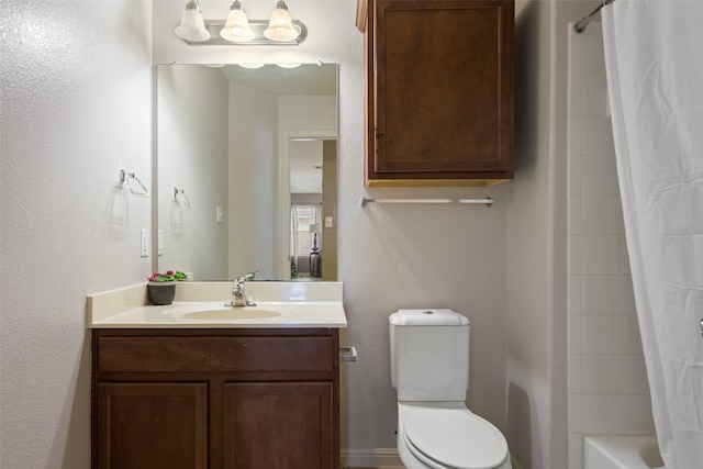 full bathroom with vanity, toilet, and shower / tub combo with curtain