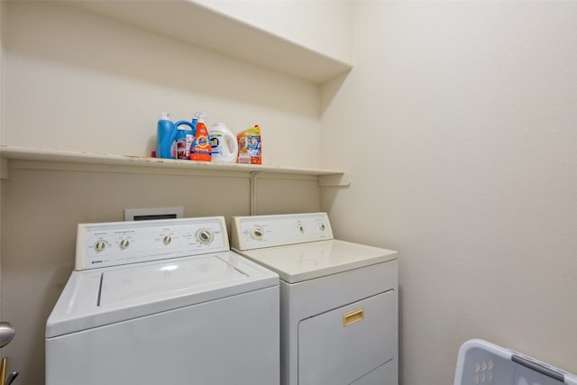 washroom featuring separate washer and dryer