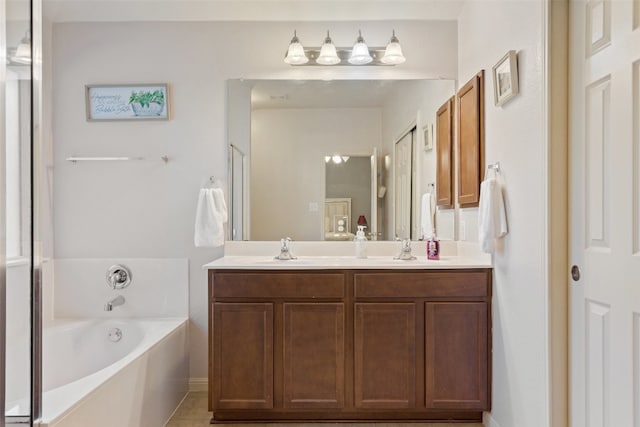 bathroom featuring vanity, independent shower and bath, and tile patterned floors