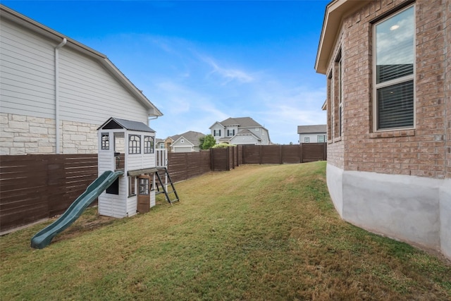 view of yard featuring a playground