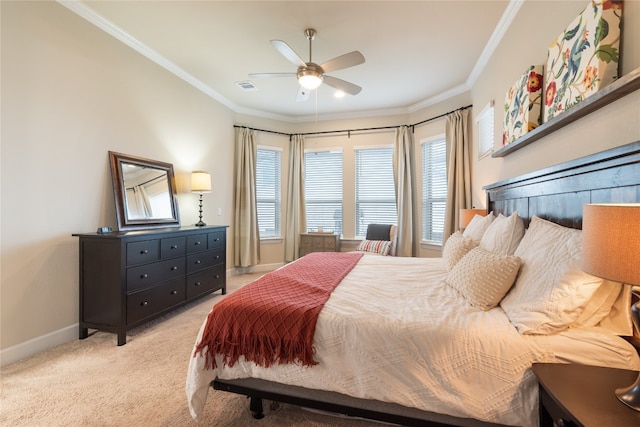 carpeted bedroom featuring ceiling fan and ornamental molding