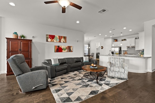 3224 Desert Shade Bnd, Leander, TX 78641 - living room with a ceiling fan, dark wood-type flooring, and recessed lighting