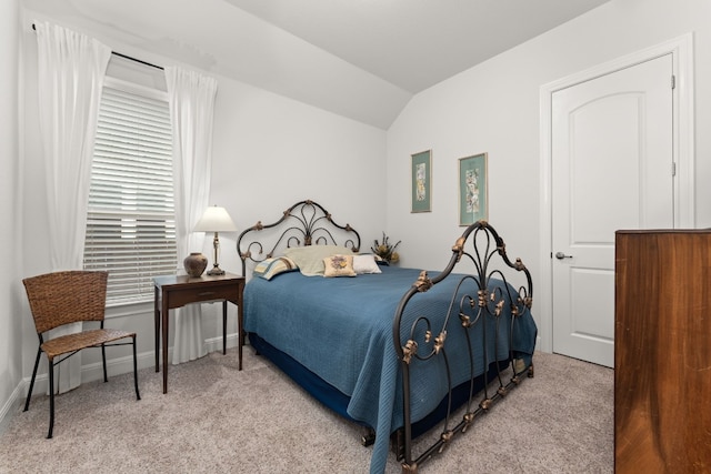 3224 Desert Shade Bnd, Leander, TX 78641 - carpeted bedroom with vaulted ceiling and baseboards