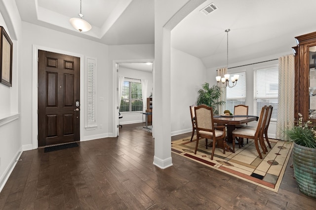 3224 Desert Shade Bnd, Leander, TX 78641 - entrance foyer featuring hardwood / wood-style floors, a chandelier, a tray ceiling, and vaulted ceiling