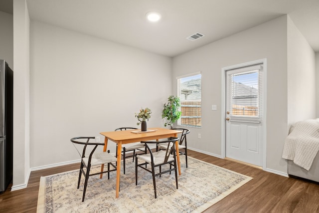 dining room featuring dark hardwood / wood-style floors