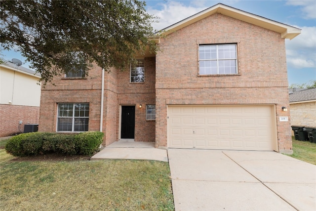 view of front of property featuring central air condition unit, a front yard, and a garage