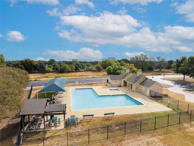 view of swimming pool featuring a patio area