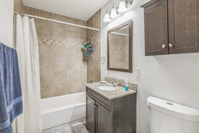 full bathroom featuring vanity, toilet, and shower / tub combo