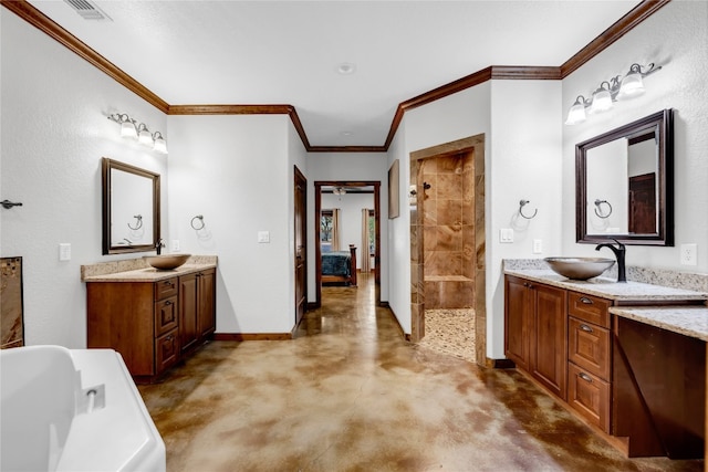 bathroom featuring vanity, crown molding, and separate shower and tub