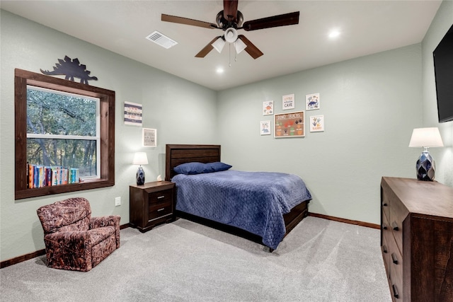 carpeted bedroom with ceiling fan