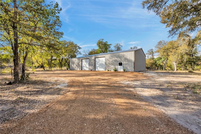 view of outdoor structure featuring a garage