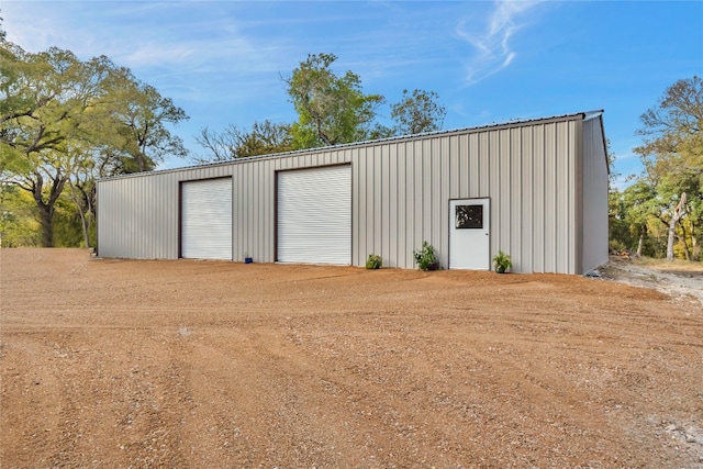 view of outdoor structure featuring a garage