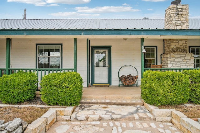 entrance to property with covered porch