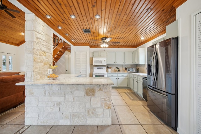 kitchen with kitchen peninsula, white cabinets, ceiling fan, appliances with stainless steel finishes, and wooden ceiling