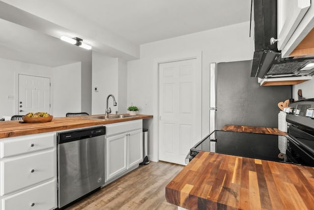 5616 Emerald Forest Dr Unit 101, Austin, TX 78745 - kitchen featuring wooden counters, dishwasher, a sink, and light wood-style floors