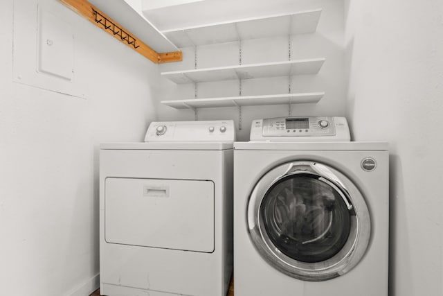 laundry room featuring separate washer and dryer