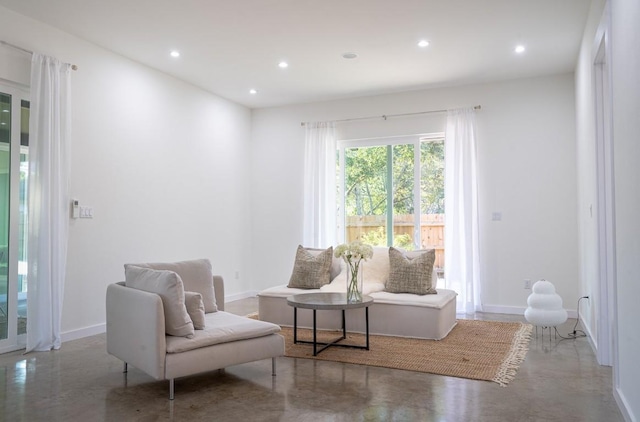 sitting room with concrete floors