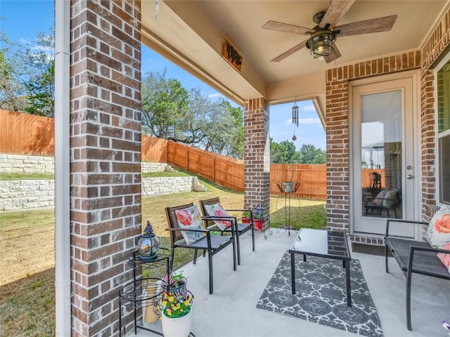 view of patio with ceiling fan