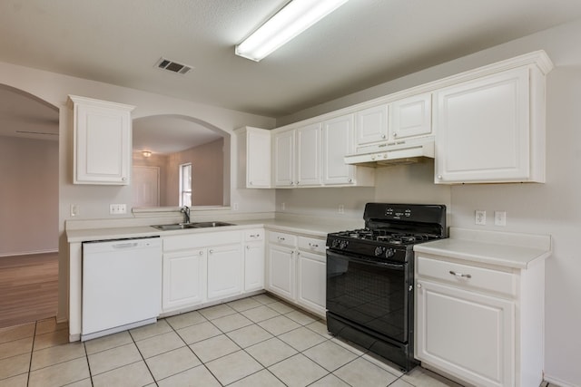 kitchen featuring sink, black range with gas cooktop, white dishwasher, white cabinets, and light tile patterned flooring