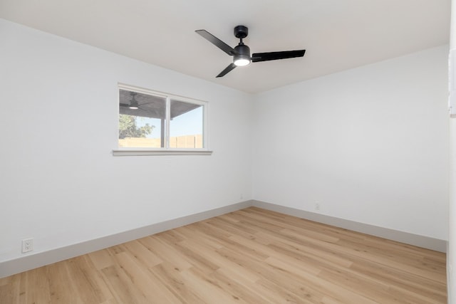 unfurnished room featuring light hardwood / wood-style floors and ceiling fan