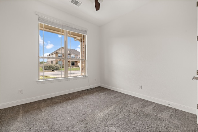 spare room with ceiling fan and carpet floors