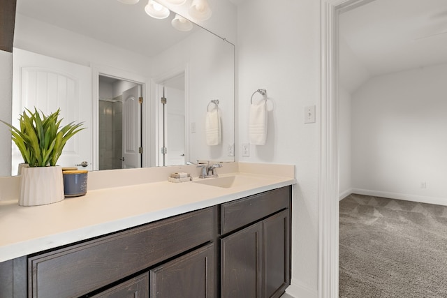 bathroom with vanity and walk in shower