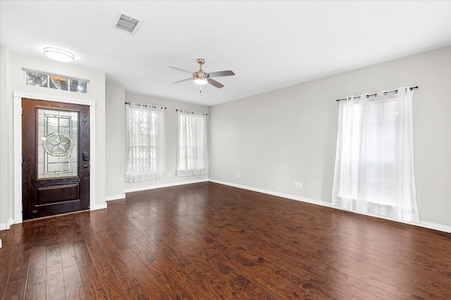 foyer entrance featuring dark hardwood / wood-style floors and ceiling fan