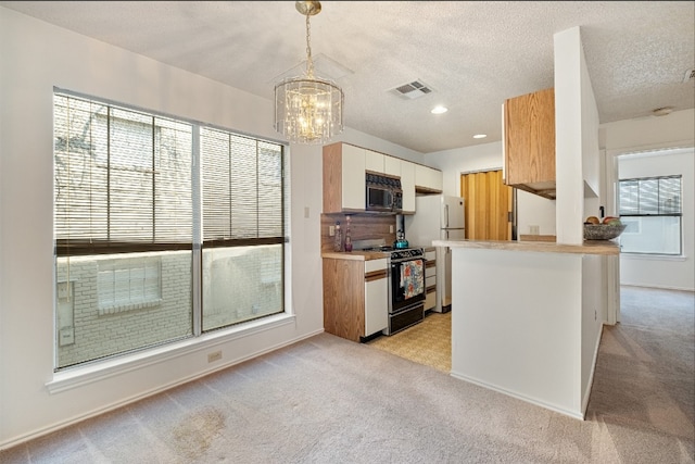 kitchen featuring light carpet, kitchen peninsula, pendant lighting, and white appliances