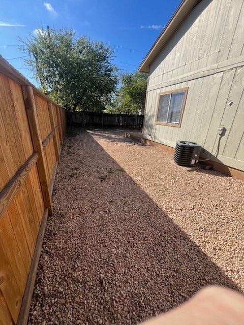 view of yard featuring cooling unit