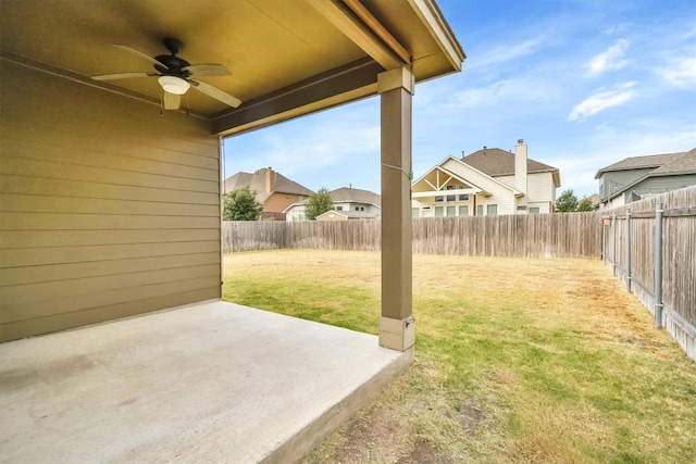 view of yard featuring a patio and ceiling fan