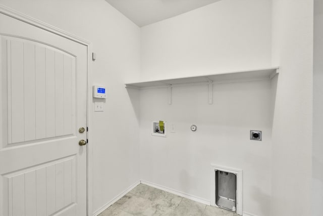 clothes washing area with electric dryer hookup, washer hookup, and hookup for a gas dryer