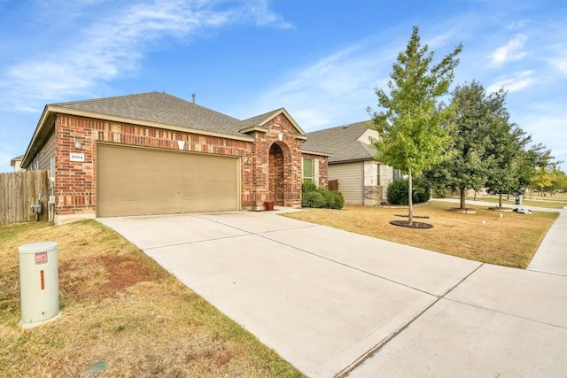 single story home featuring a garage