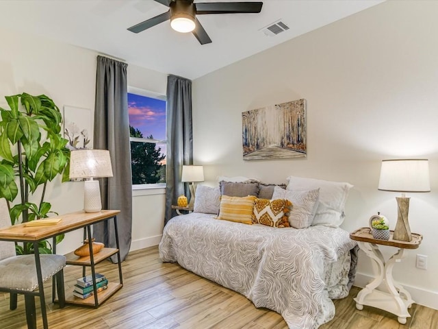 570 Quick Draw, Horseshoe Bay, TX 78657 - bedroom with wood finished floors and ceiling fan