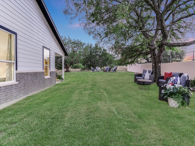 view of yard with an outdoor hangout area