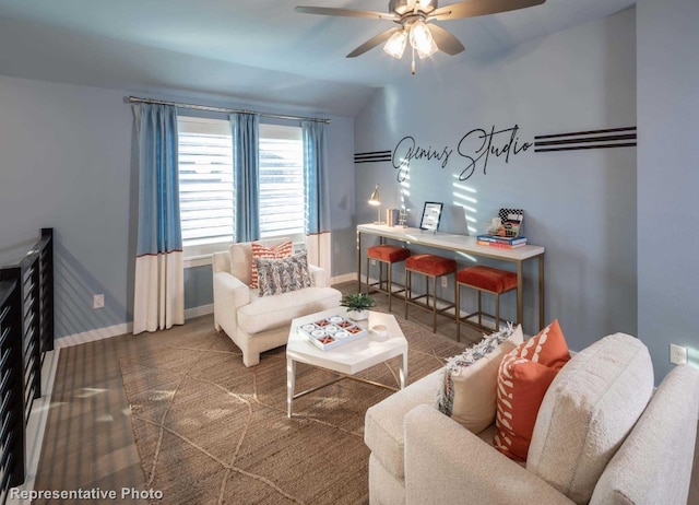 living room with lofted ceiling and ceiling fan