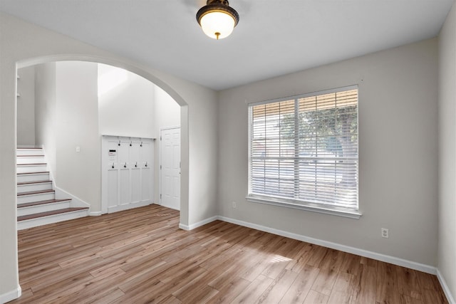 spare room with light hardwood / wood-style flooring