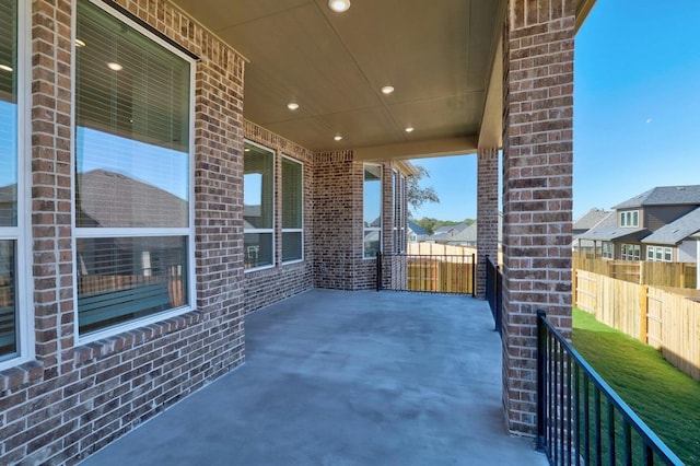view of patio featuring fence