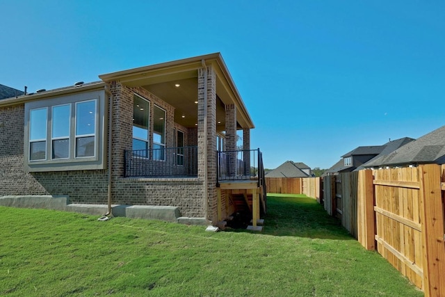 view of side of property with brick siding