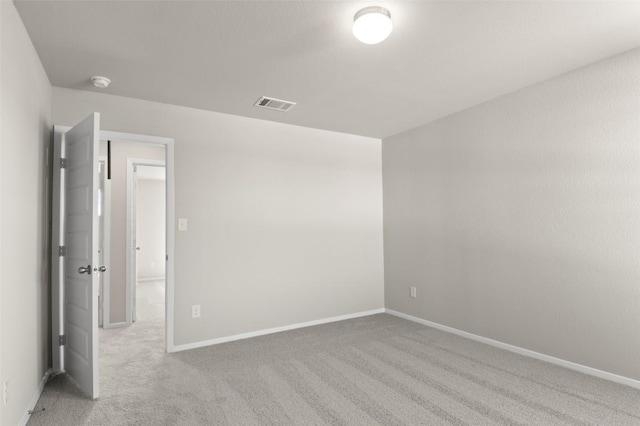 160 Lavender Ln, Elgin, TX 78621 - carpeted spare room with baseboards and a smoke detector