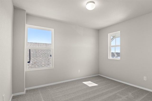 160 Lavender Ln, Elgin, TX 78621 - carpeted empty room with baseboards