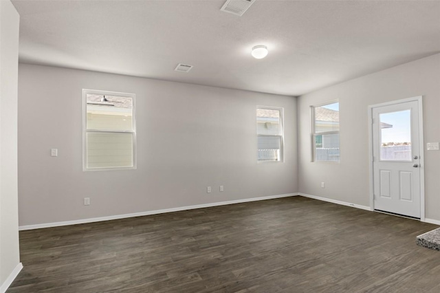 160 Lavender Ln, Elgin, TX 78621 - empty room with dark wood-type flooring and baseboards