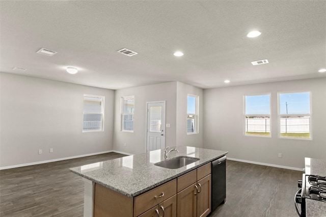 160 Lavender Ln, Elgin, TX 78621 - kitchen with a sink, dark wood-style flooring, dishwashing machine, baseboards, and light stone counters